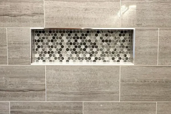 Custom tile shower niche installed by Schluter certified contractor in Edison, NJ