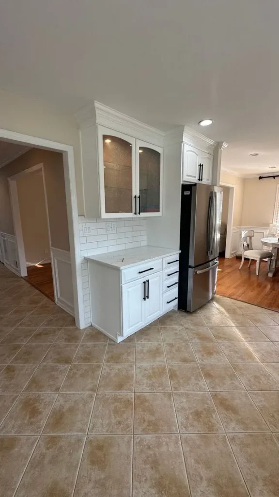 Kitchen nook remodel with white cabinets and subway tile in Middlesex County, NJ